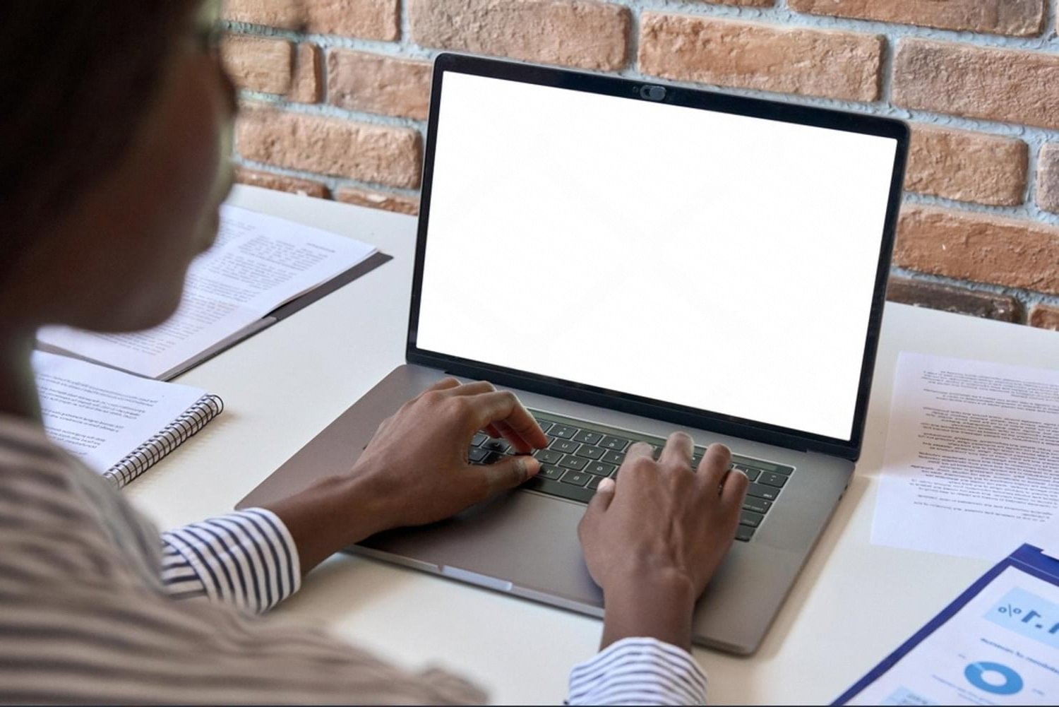 Person at a laptop researching domain registration for a UAE business